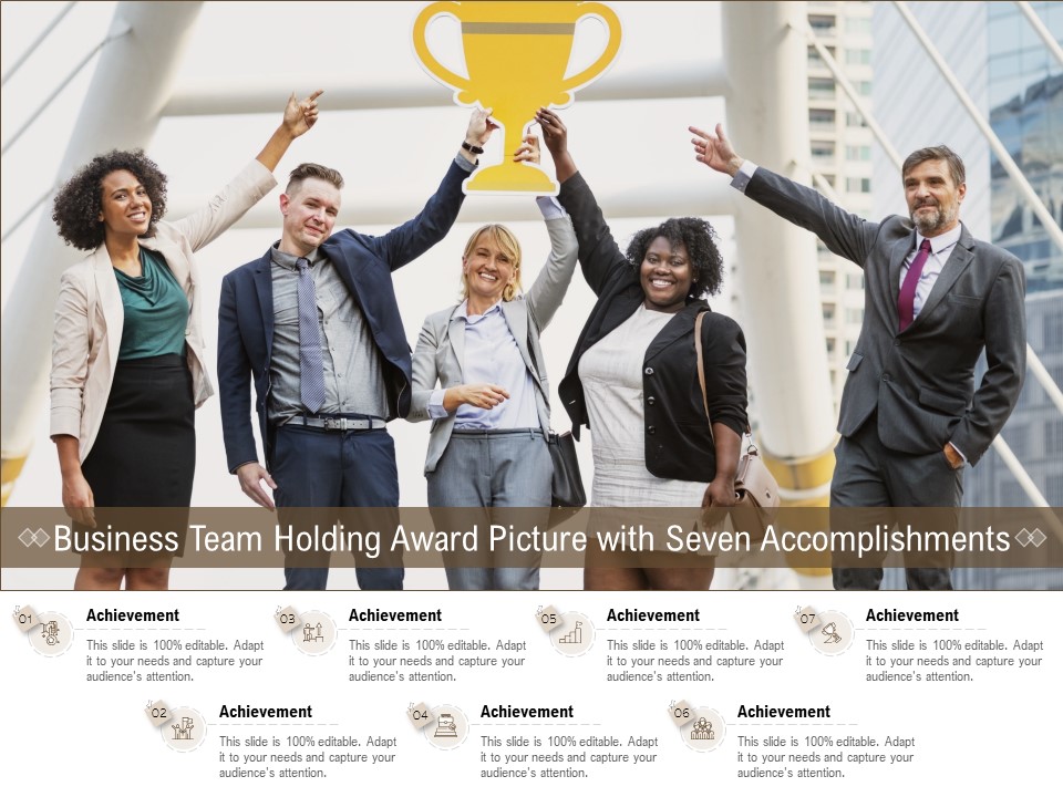 Business Team Holding Award Picture With Seven Accomplishments Ppt PowerPoint Presentation Model Topics