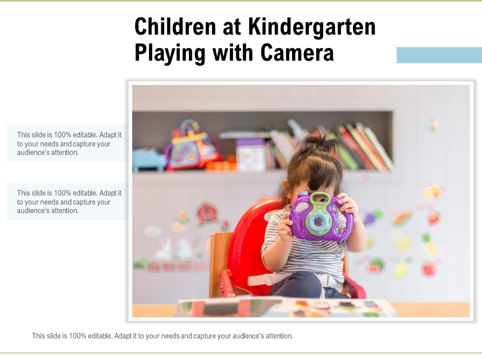 Children At Kindergarten Playing With Camera Ppt PowerPoint Presentation Styles Format PDF