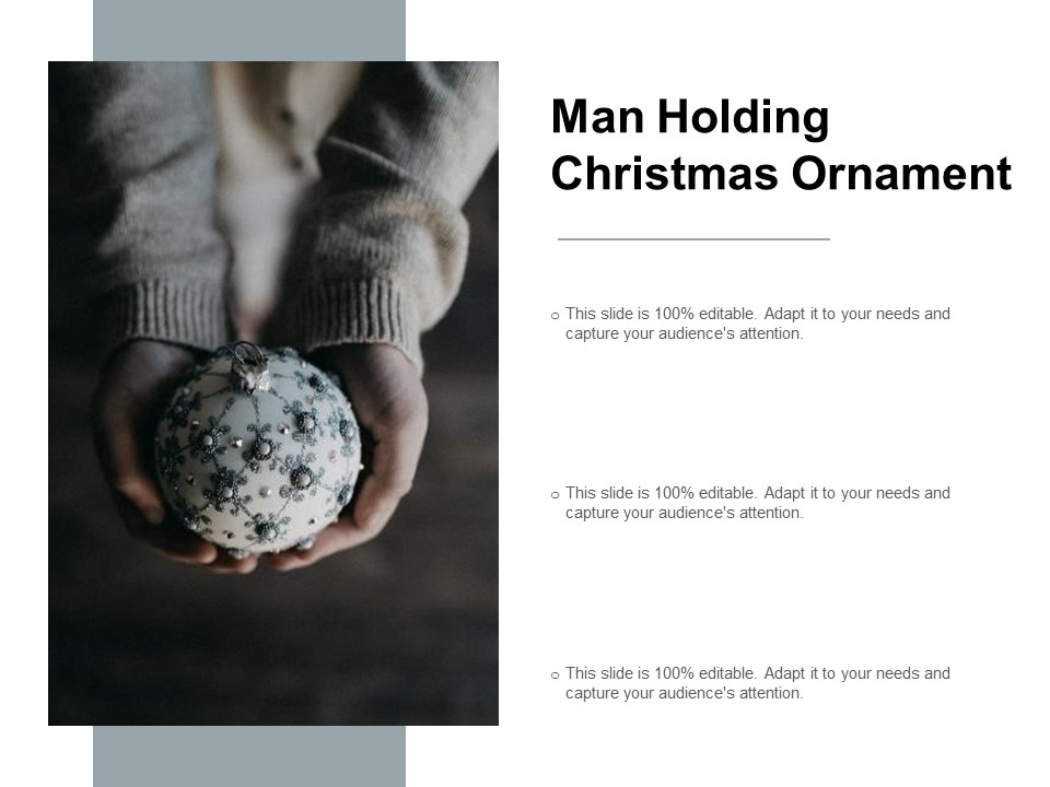 Man Holding Christmas Ornament Ppt PowerPoint Presentation Portfolio Brochure